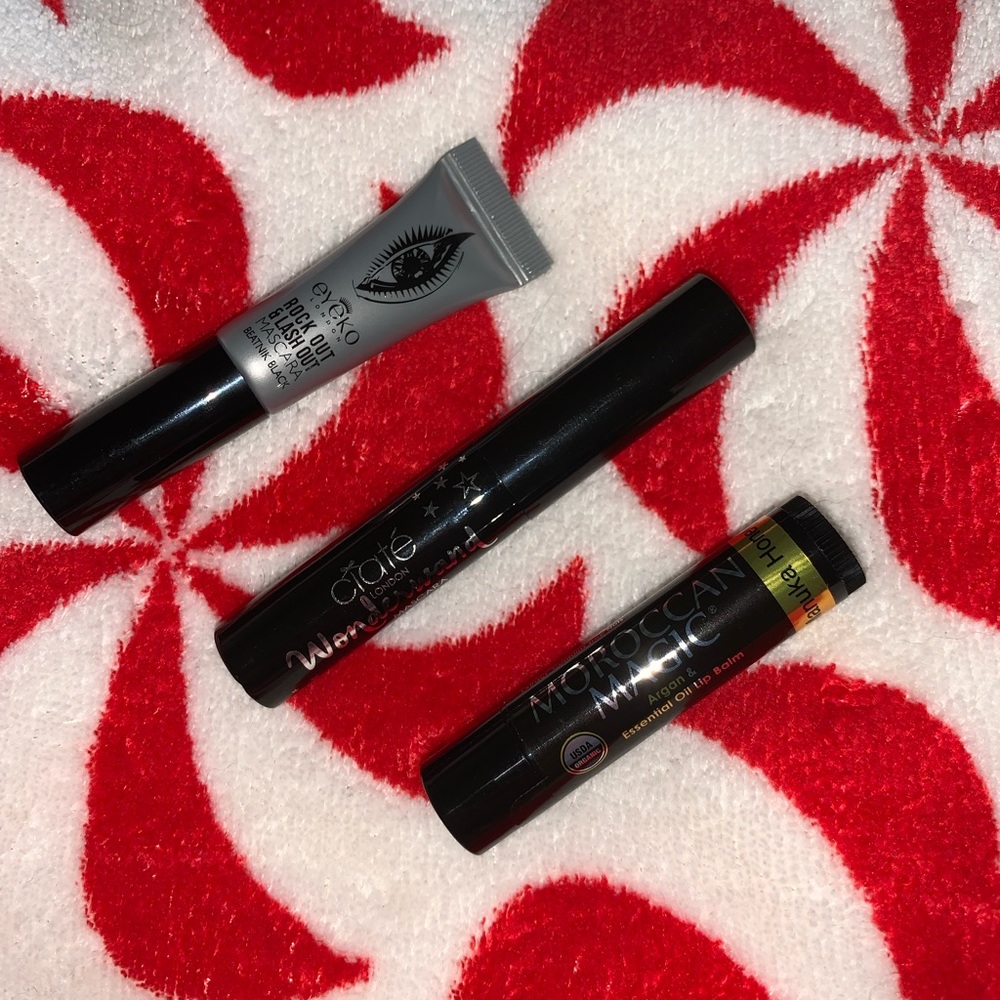 A mix of 2 brand new mascaras & 1 brand new lip balm